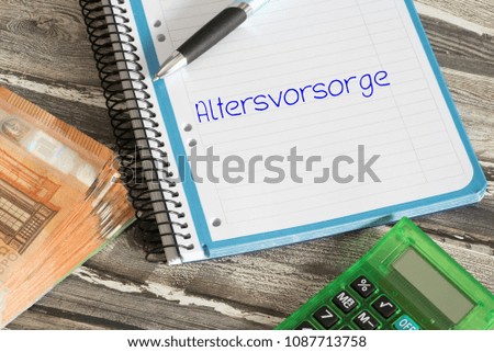Euro bills and a copybook with the german word for pensions