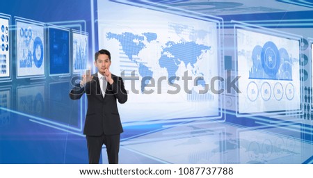 Businessman touching and interacting with Image of technology interface panels