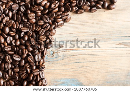 roasted coffee beans wood background