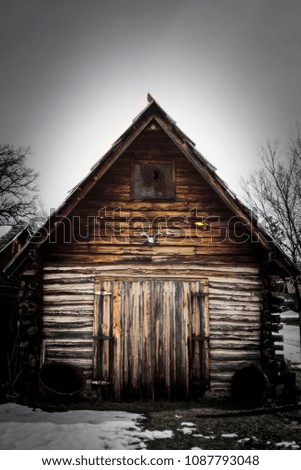 A unique worn-down cabin taken in early spring