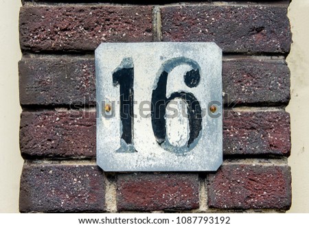 House number sixteen (16).