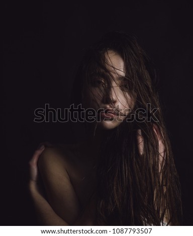Beauty girl with healthy young skin and bare shoulders. Girl with natural makeup and long hair. Royalty-Free Stock Photo #1087793507