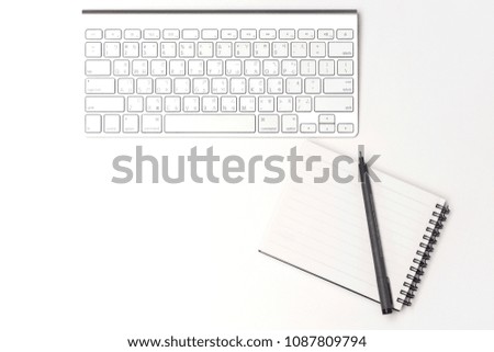 Keyboard and pen on White background