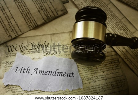 14th Amendment news headline on pages of the US Consitution                                Royalty-Free Stock Photo #1087824167