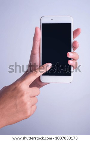woman hand and holding a smart phone