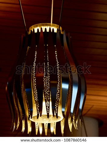 A yellow hanging lights of a restaurant interior isolated unique photograph