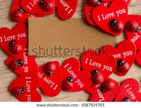 Valentine day background,hearts border on wood with a gift