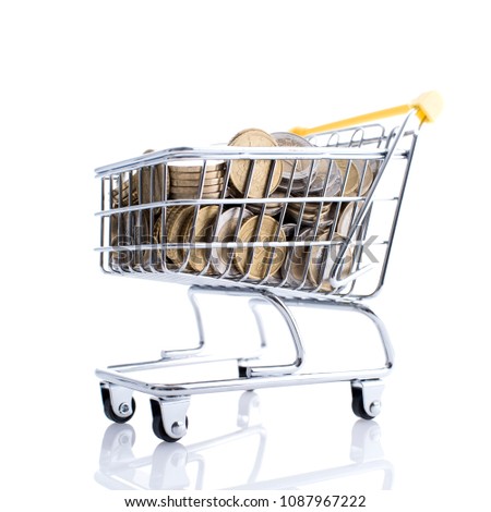 Supermarket shopping cart full of money on white background: retail, price and savings concept