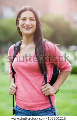 A portrait of a hispanic college student at campus