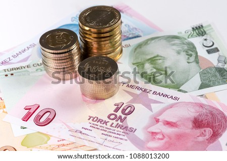 Turkish Lira banknotes and coins. Royalty-Free Stock Photo #1088013200
