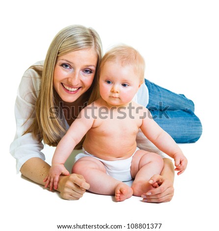 Mother holding cute infant girl isolated on white