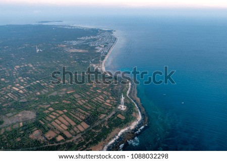 Aerial view of landscape with Turbine Green Energy Electricity, Windmill for electric power production, Wind turbines generating electricity  on Phu Qui island, Binh Thuan, Vietnam. 