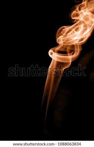 Smoke magical color isolate from black color background (vertical).