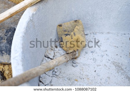 Hole in the bucket in construction site