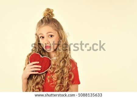 small kid holding heart. Valentine's Day and love concept, isolated on white background, copy space
