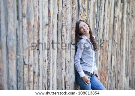 portrait of beautiful brunette young woman outdoor