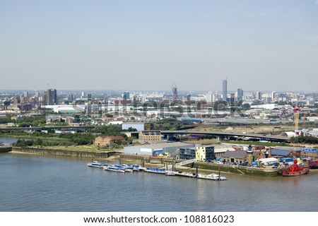 Aerial view of Newham, East London.  With Trinity Buoy Wharf at the front and the stadium at Stratford to the rear.
