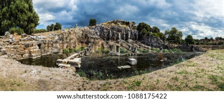 Ancient Greece, ruins of the harbor in town Oiniades Royalty-Free Stock Photo #1088175422
