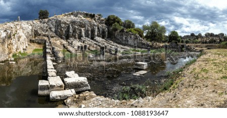 Ancient Greece, ruins of the harbor in town Oiniades Royalty-Free Stock Photo #1088193647