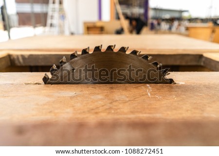 Table saw cutting wood Royalty-Free Stock Photo #1088272451