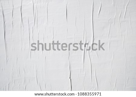 white poster layer glued with wallpaper paste Royalty-Free Stock Photo #1088355971