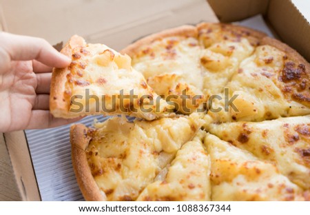 pizza in delivery box