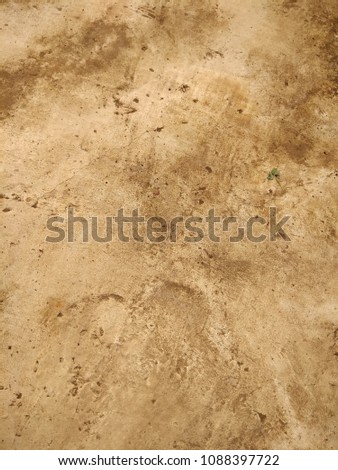 The Grunge of the Concrete surface. The Depiction of the Nebula (the birthplace of Stars). Abstract background of Brown, Black and White color. 