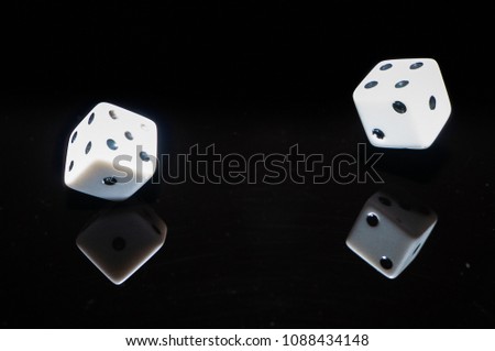 Falling dice with reflection. Numbers one, two, four and five.