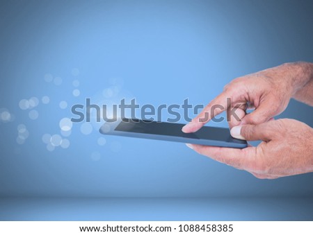 Hand touching smart screen with blue background