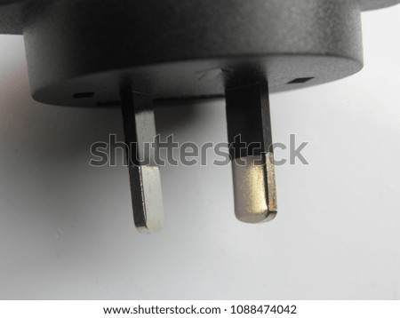 Black color 2 pin power plug adapter on white background