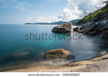 Long exposure shot.Beautiful sea scape with stone beach on a summer vacation,Motion blur,slow shutter speed.