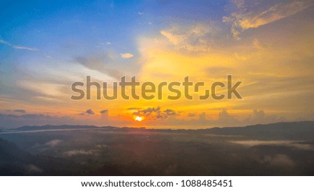 aerial Photography fog above the mountain in tropical rainforest and beautiful sunset scenery viewPhang Nga valley