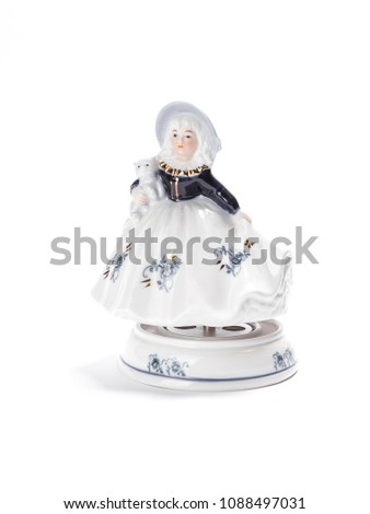 porcelain figurines-girls on a white background