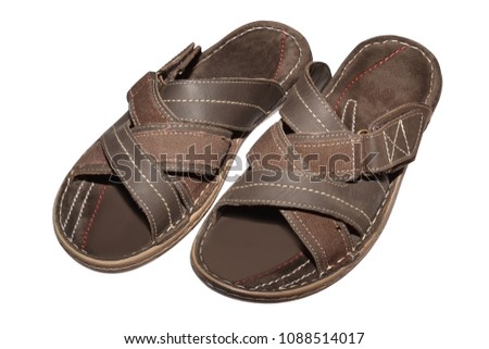 Brown leather slippers isolated on white background