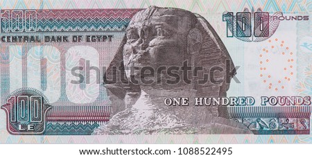 Head of the Sphinx Statue Pharaoh King's Mask Tutankhamoun, Portrait from Egypt 100 Pounds 2007 banknotes. Royalty-Free Stock Photo #1088522495