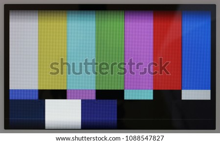 Test pattern  of color television lines on the no name modern tablet  real screen with resolution 1024 by 600 pixels. A well visible point like LED texture