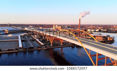 Aerial view of city at dawn. Industrial cityscape. Milwaukee, Wisconsin, USA.  Industrial pollution, emissions
