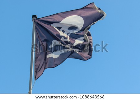Pirate flag blowing in the wind