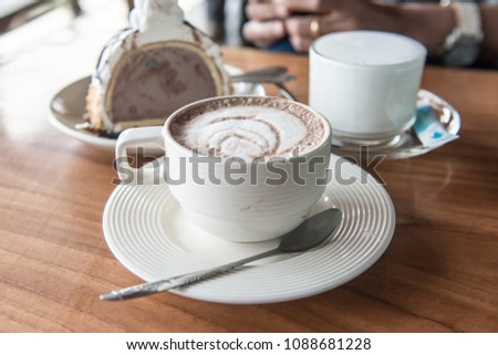 Hot chocolate in a white cup, Thailand.