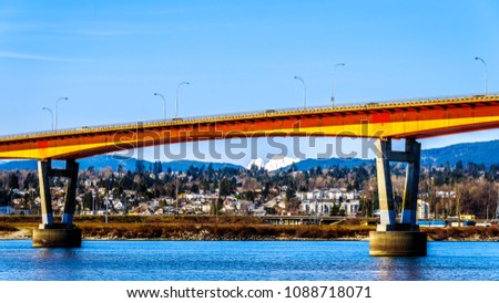 Mission Bridge over the Fraser River on Highway 11 between the towns of Abbotsford and Mission in British Columbia, Canada Royalty-Free Stock Photo #1088718071