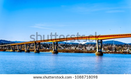 Mission Bridge over the Fraser River on Highway 11 between the towns of Abbotsford and Mission in British Columbia, Canada Royalty-Free Stock Photo #1088718098