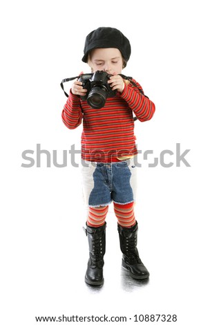 photograph - naughty child with photo cameda over white