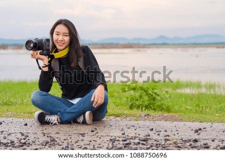 Asian teen girl  Travel Photography.Travel Tourism Camera Photograph Wanderlust Concept