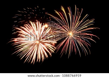 Colorful multi-colored fireworks, salute on the background of the black sky on holiday