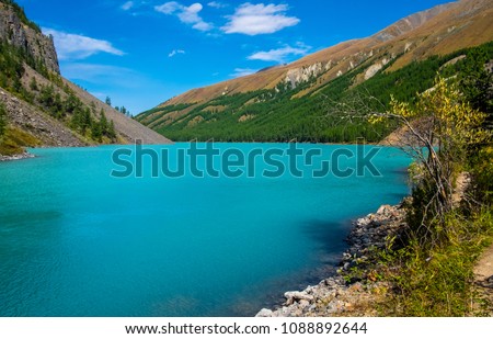 Mountain landscape. Mountain lake Shavlinskoe in the republic of Altai.