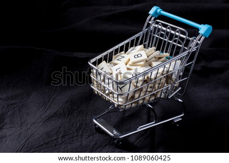 alphabet letters in a shopping cart