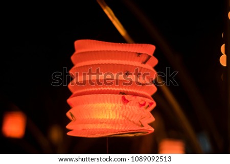 Chinese traditional red tanglung lantern at night . Soft focus.
