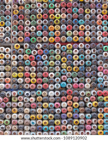 Photo Of  unique colorful weathered  Grungy spray paint cans background
