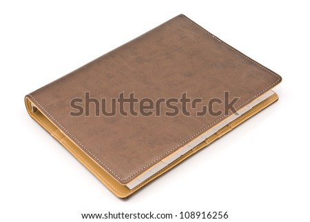 Brown notebook isolated on white background