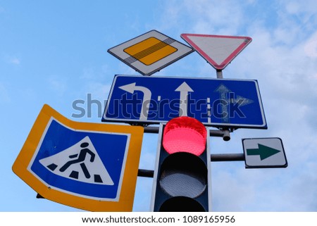 directional road signs close up over blue sky